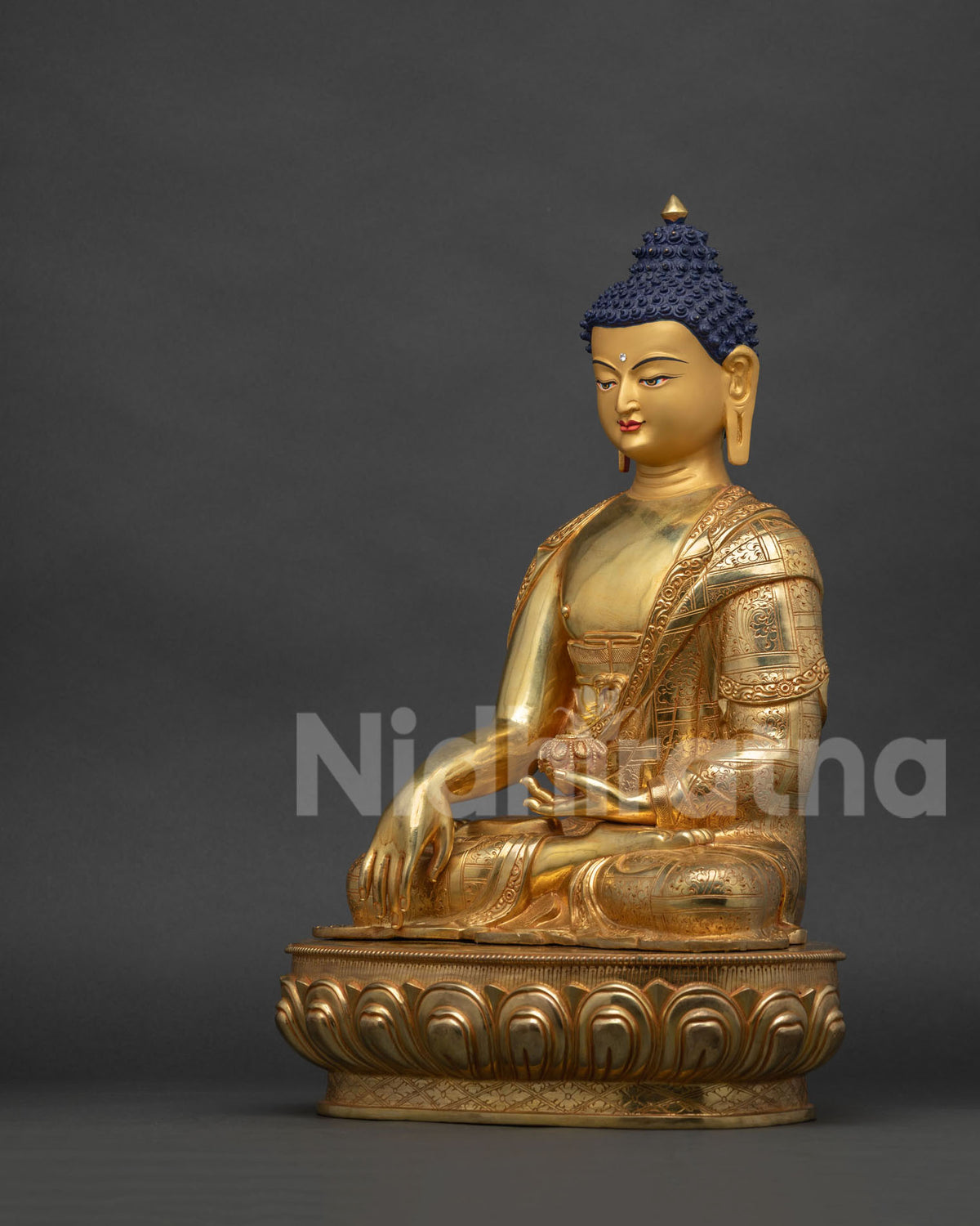 Left side view of handcrafted Shakyamuni Buddha copper statue from Nepal