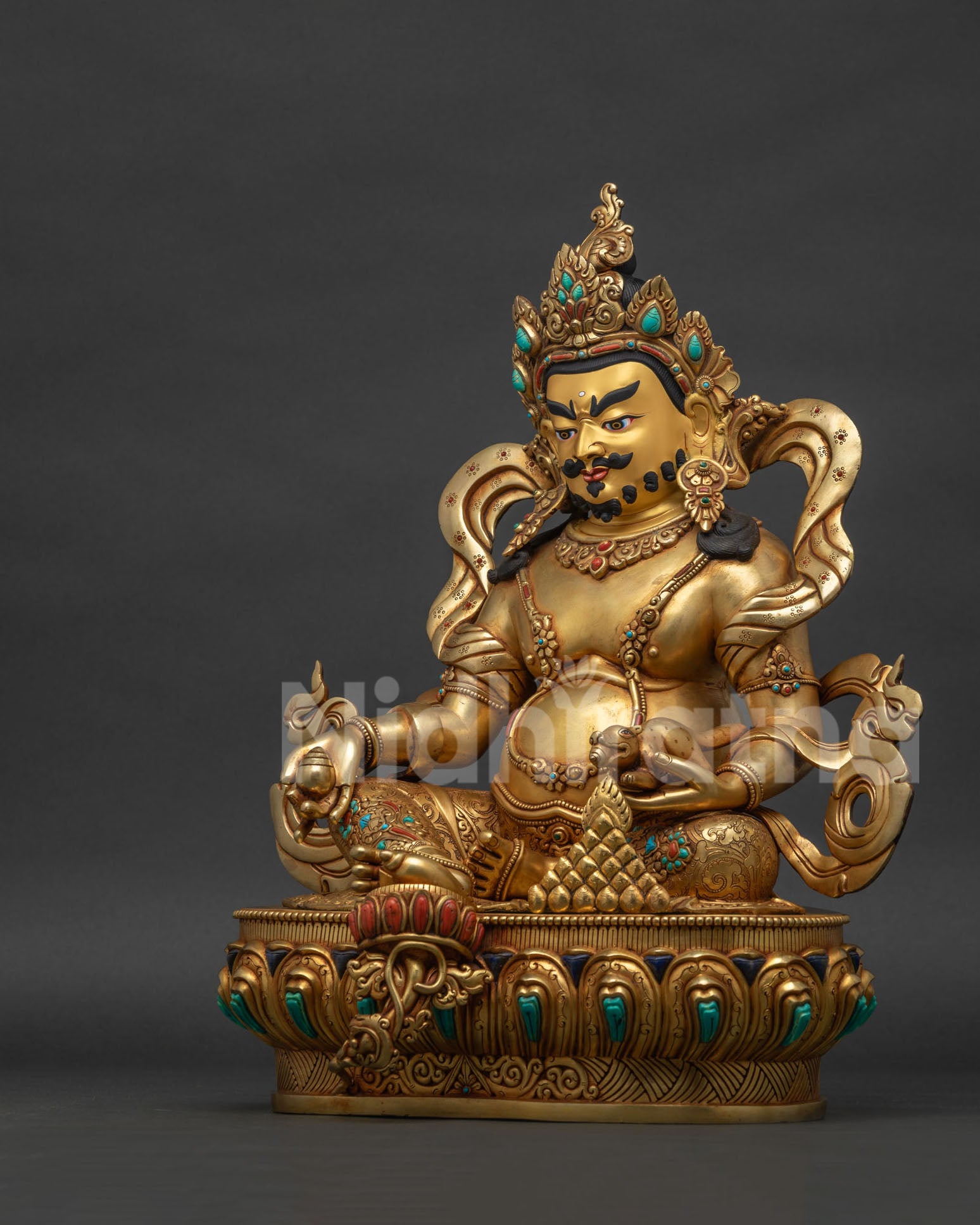 left view side of 24k gold fire-gilded dzambhala statue made by newari artisans