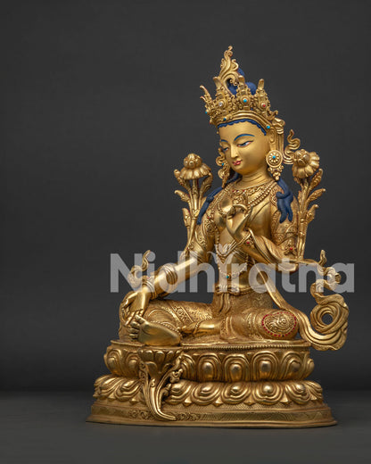 Left view side of Green Tara Statue with lotus seat and gold gilded details