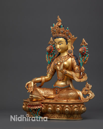 left view side green tara artisan crafted sculpture with gold gilded glow
