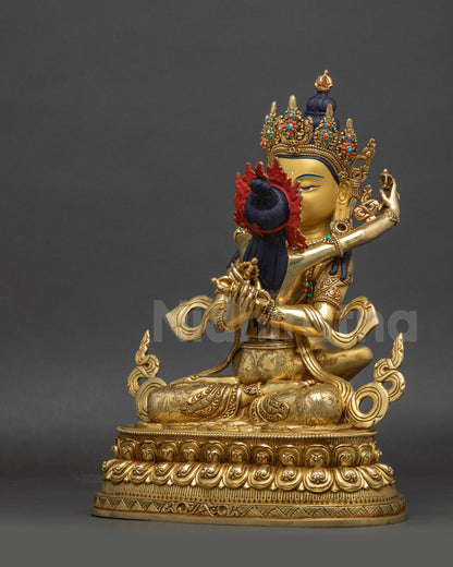left view side of Vajradhara Yab-Yum statue showing lotus pedestal carvings
