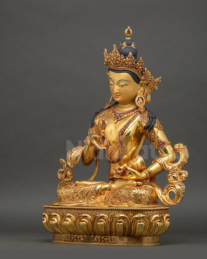 left view side of Vajrasattva Sculpture with intricate jewelry and semi-precious stones
