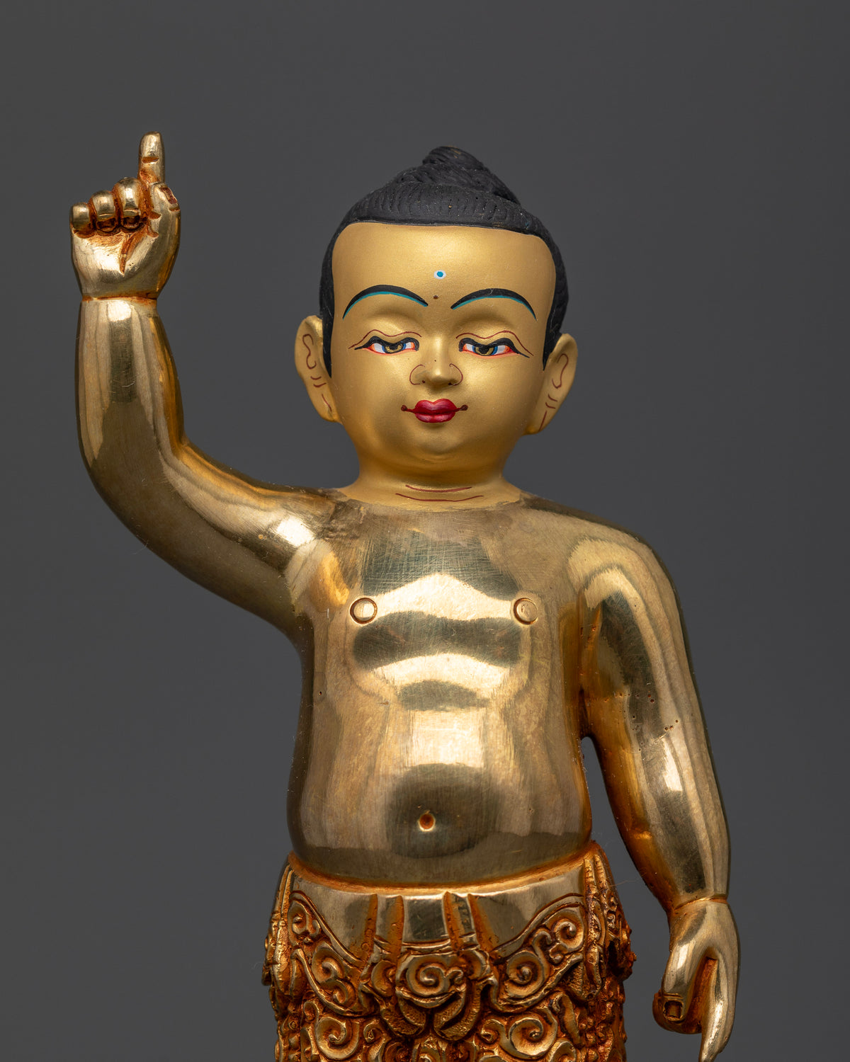 Little Shakyamuni Buddha Statue in copper with gold fire gilded finish and 24K gold painted face.