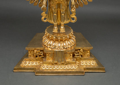 Lotus pedestal and lion throne base of gold fire-gilded Chenrezig statue with carved lions