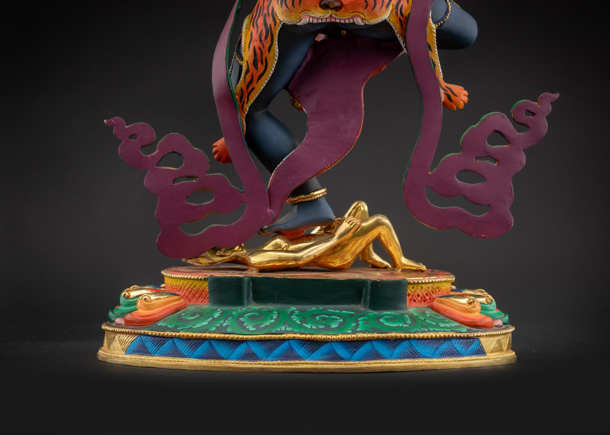 lower landscape back Simha Mukha statue back view showing radiant halo and ornate details