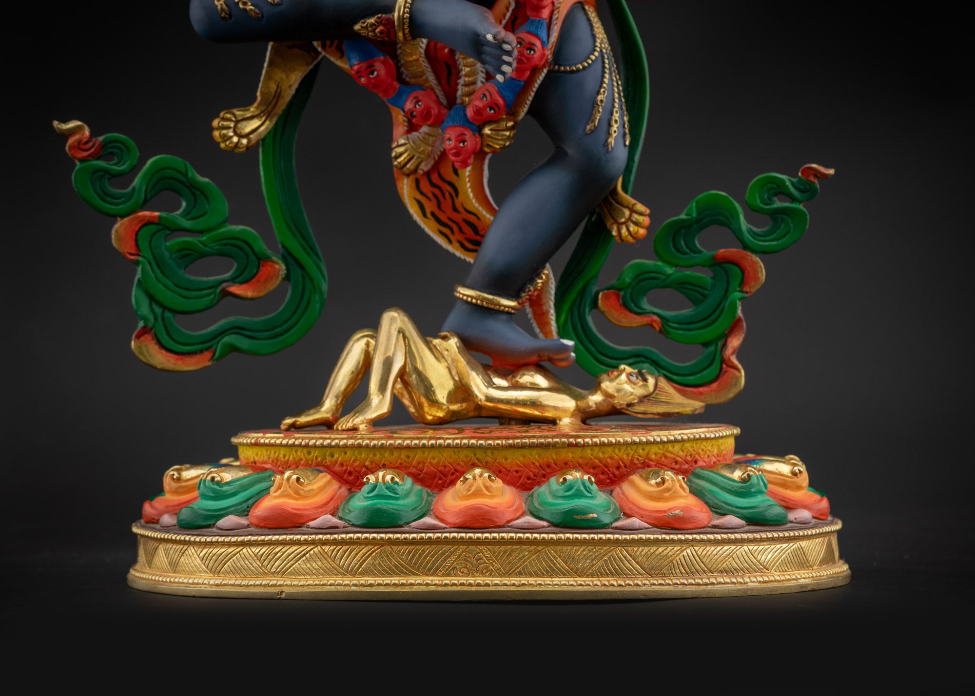 lower landscape front Simha Mukha statue front view with lotus seat and gold-plated base
