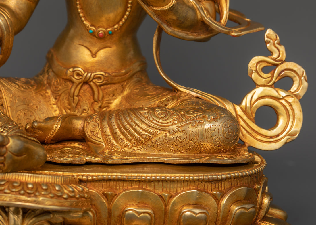 lower torso of gold plated green tara statue with height and width: 37.5cm and 29 cm