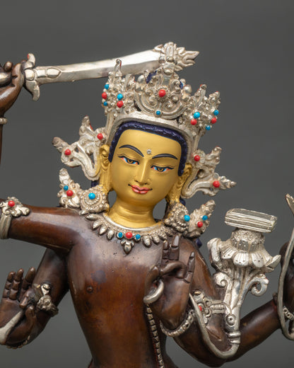 Maha Manjushri statue 24K gold painted face semi precious stones.
