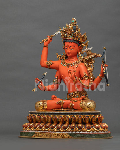 Maha Manjushri statue side profile with arrow, bow and flaming sword on a double-layered lotus seat