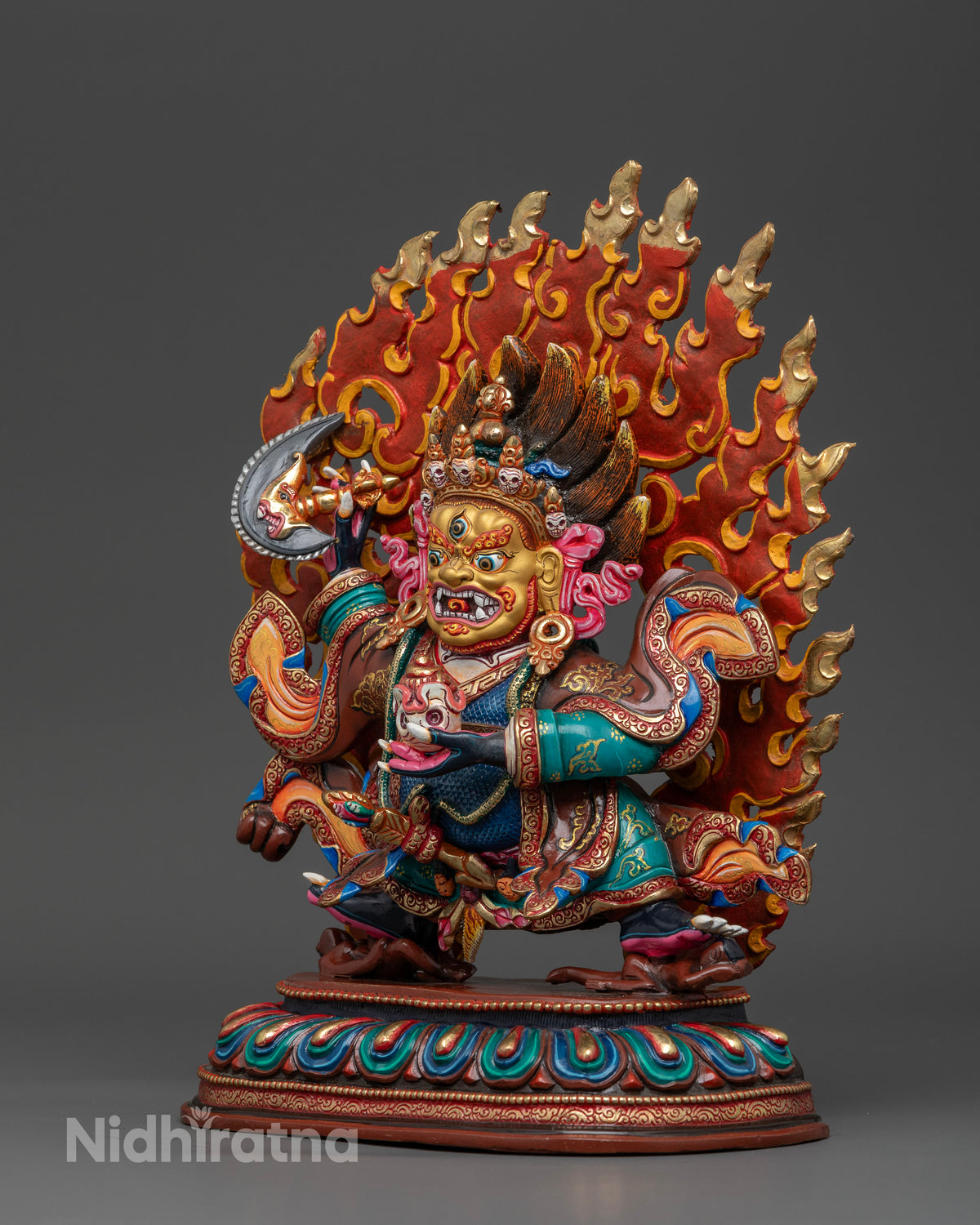 Mahakala Bernagchen holding kartika knife and kapala with flaming halo.