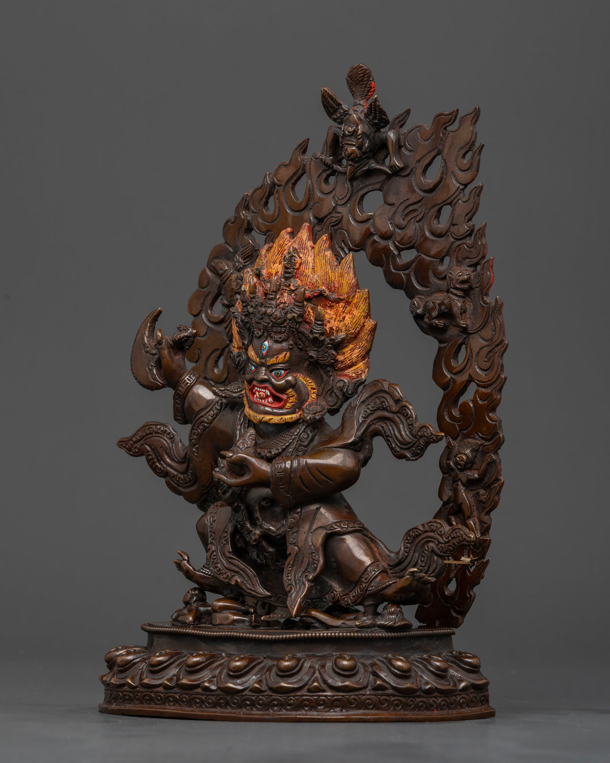 Mahakala Bernagchen holding the symbolic kartika knife and kapala