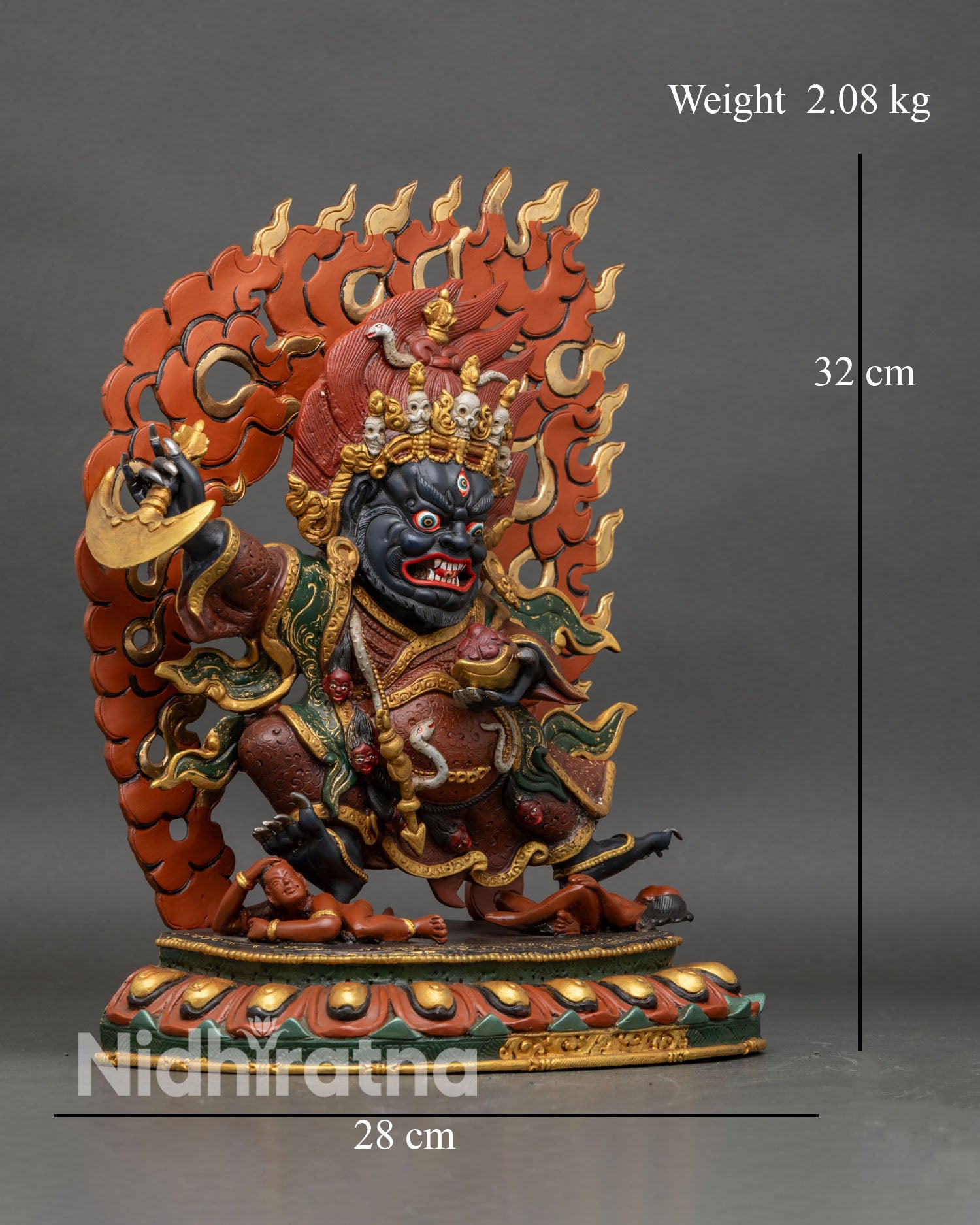 Right side view of Mahakala Bernagchen statue holding drigug and kapala on lotus base