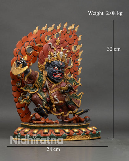 Right side view of Mahakala Bernagchen statue holding drigug and kapala on lotus base