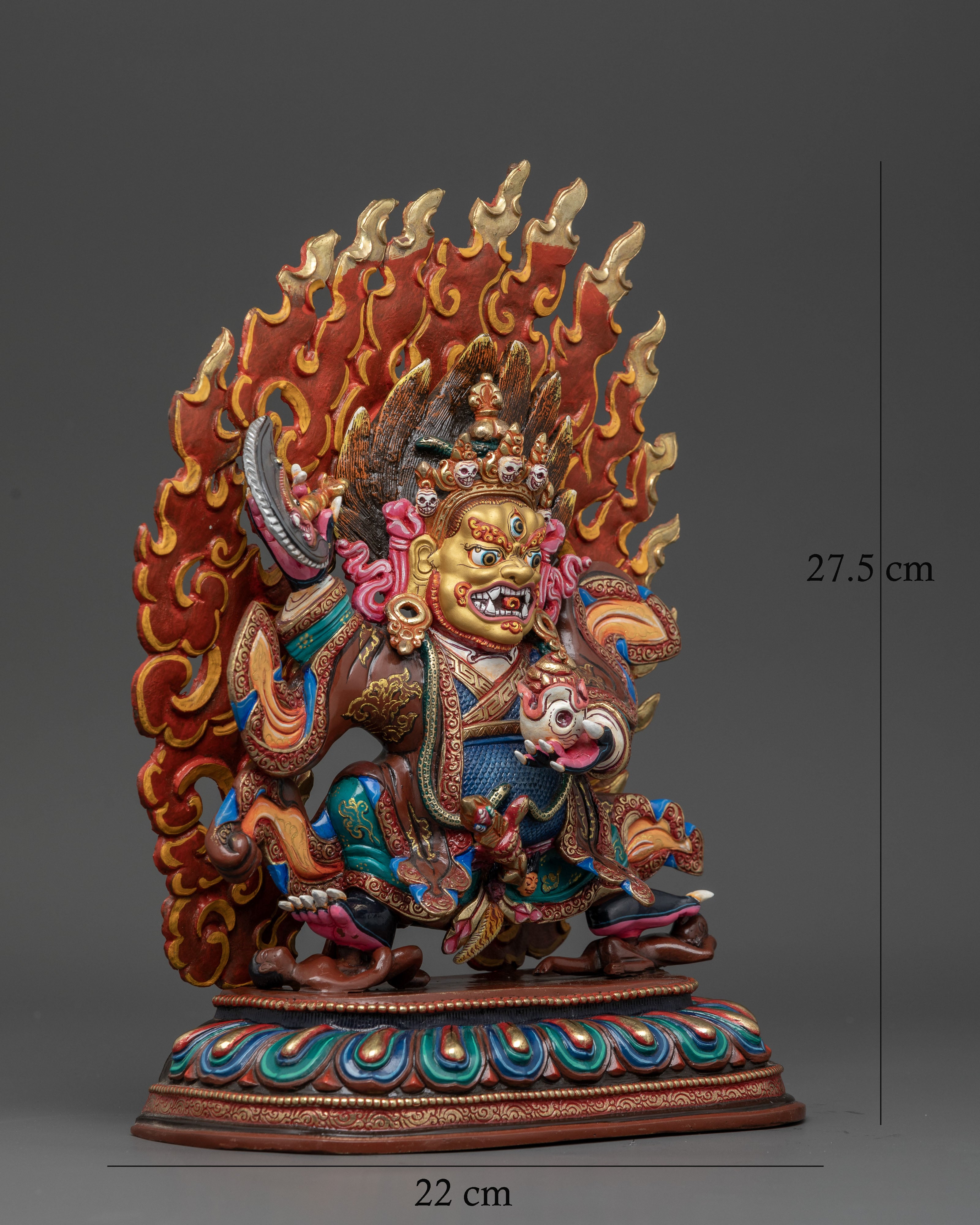 Mahakala Bernagchen standing on lotus pedestal above subdued figure.