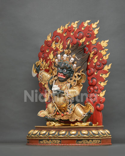 Mahakala Bernagchen Statue angled view showing wrathful pose, flaming halo and 24K gold gilding