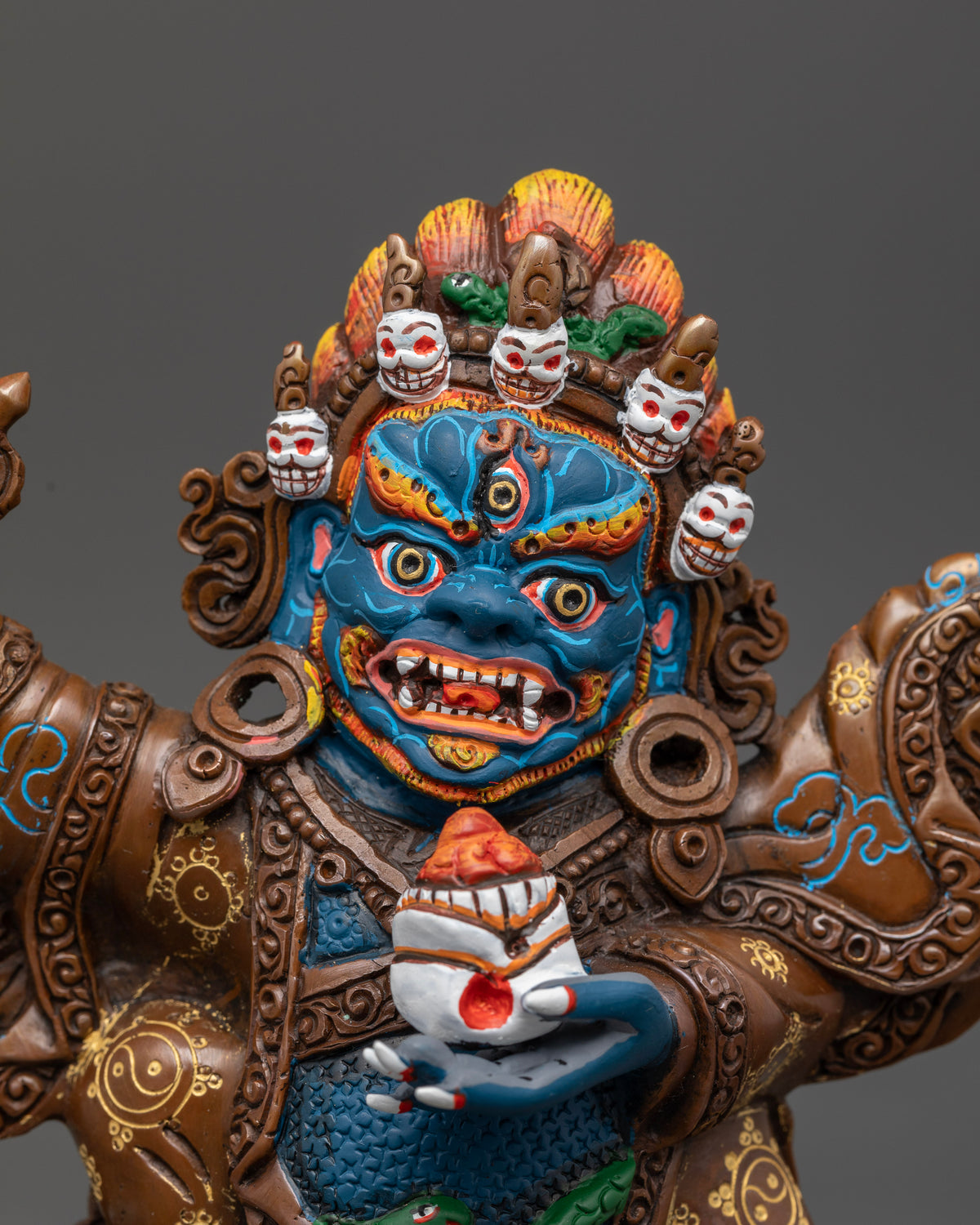 Mahakala Bernagchen Statue with five skull crown and flaming halo.