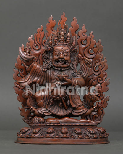 Mahakala Bernagchen Statue front view with oxidized copper finish and sacred flame halo.