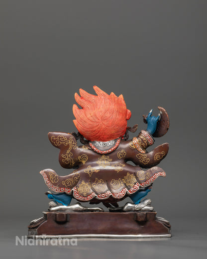 Mahakala bernagchen statue with acrylic painting and silver plated details.