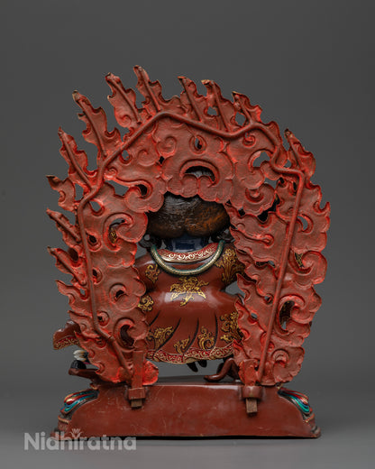 Mahakala Bernagchen holding kartika knife and kapala with flaming halo.