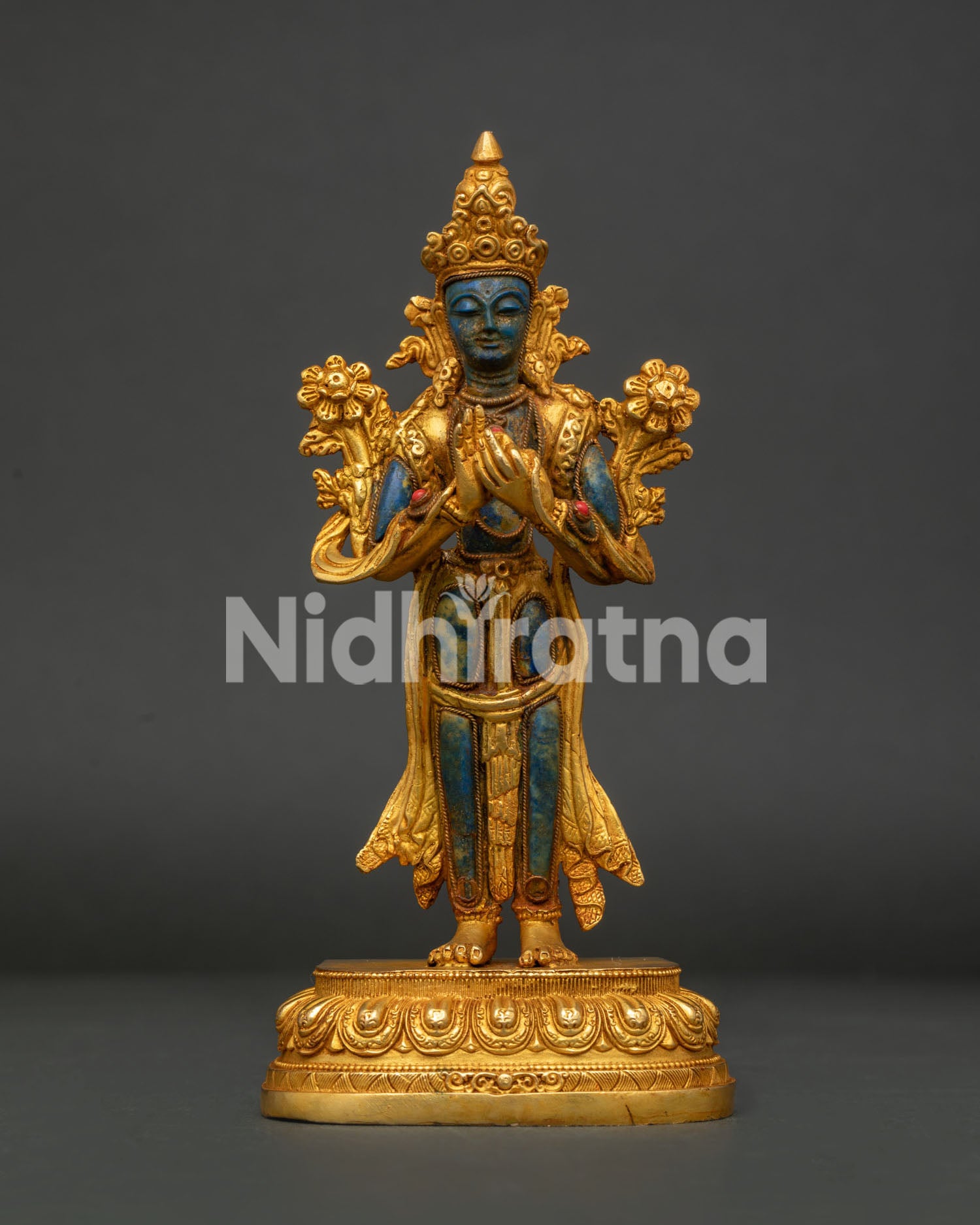 Maitreya Buddha statue carved from lapis lazuli with gold gilded copper and coral stones