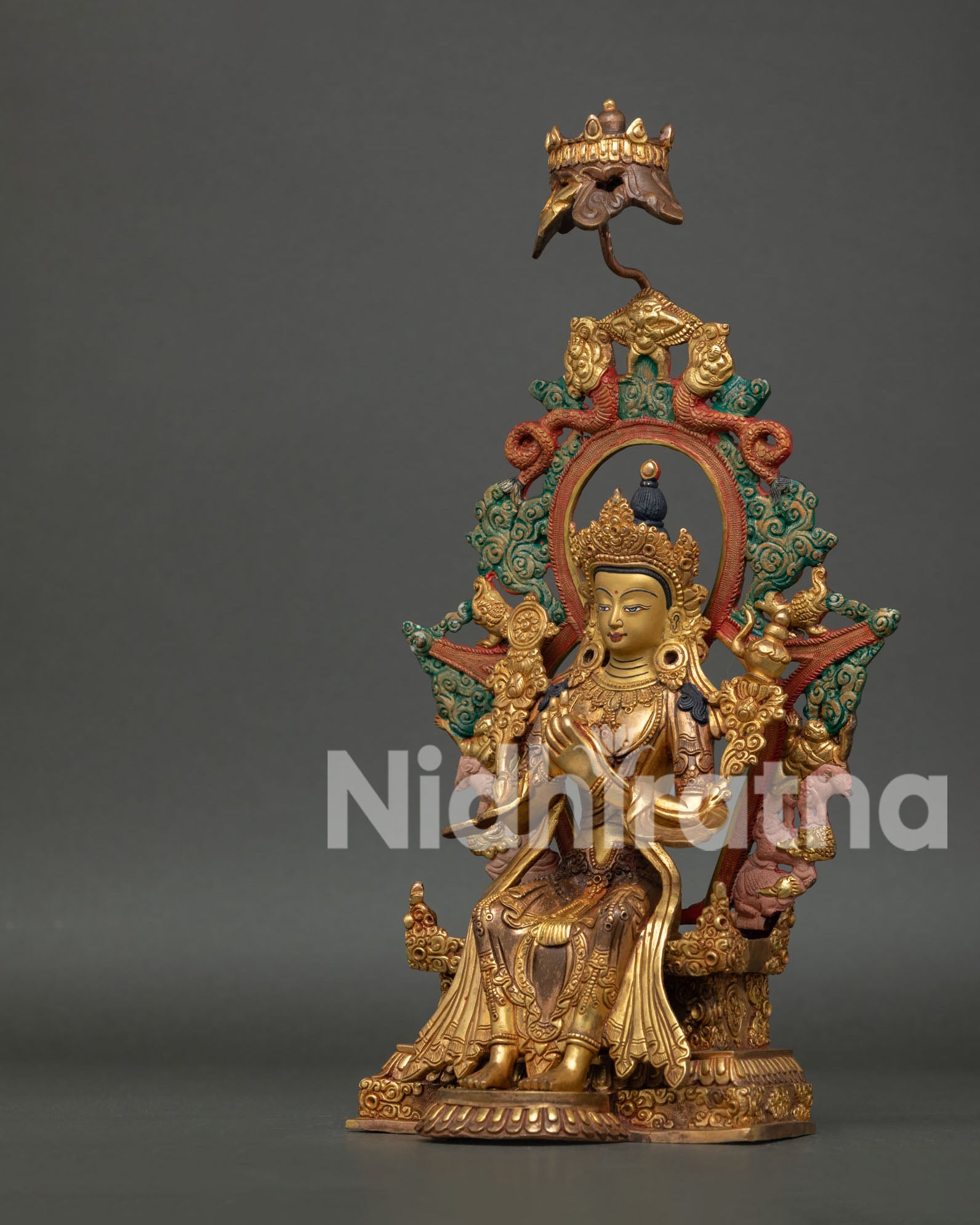 Maitreya Buddha statue ornate throne with dragons and celestial motifs.