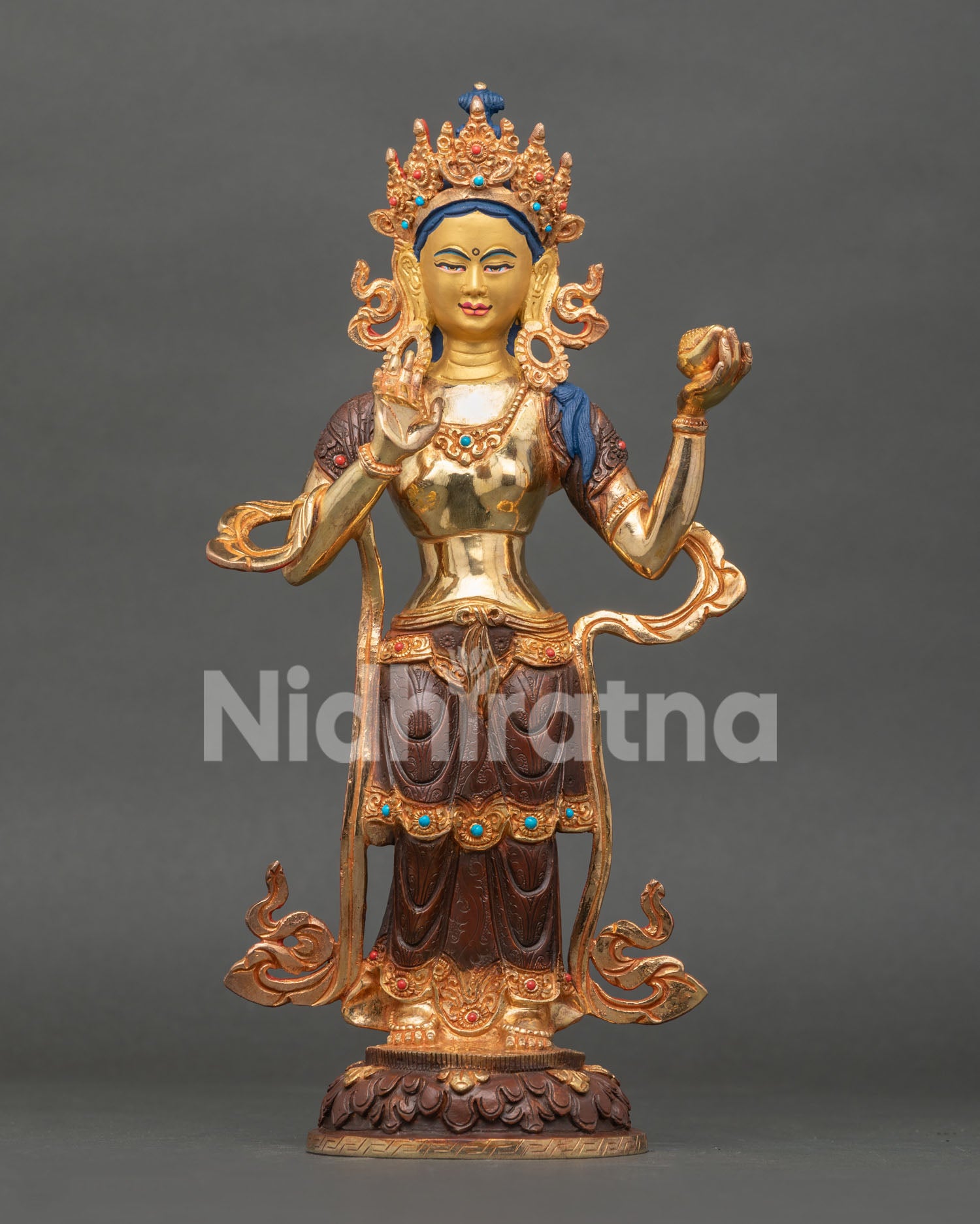 Mandarava Buddhist statue with gold painted faces and lotus seats