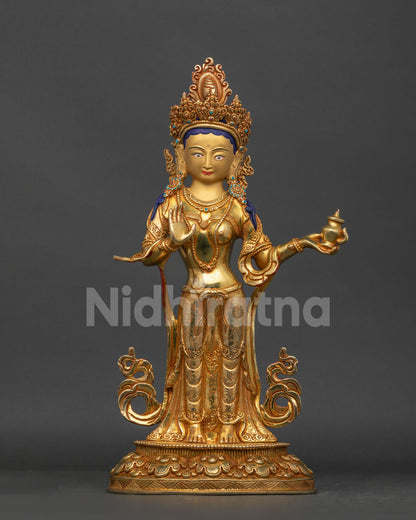 Mandarava statue in Indian attire holding a Kalash with raised Abhaya Mudra