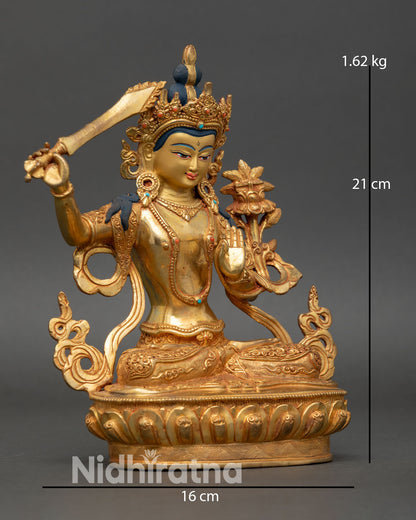 Manjushree side view holding flaming sword lotus Prajnaparamita sutra gold gilded copper statue spiritual meditation decor Nepal