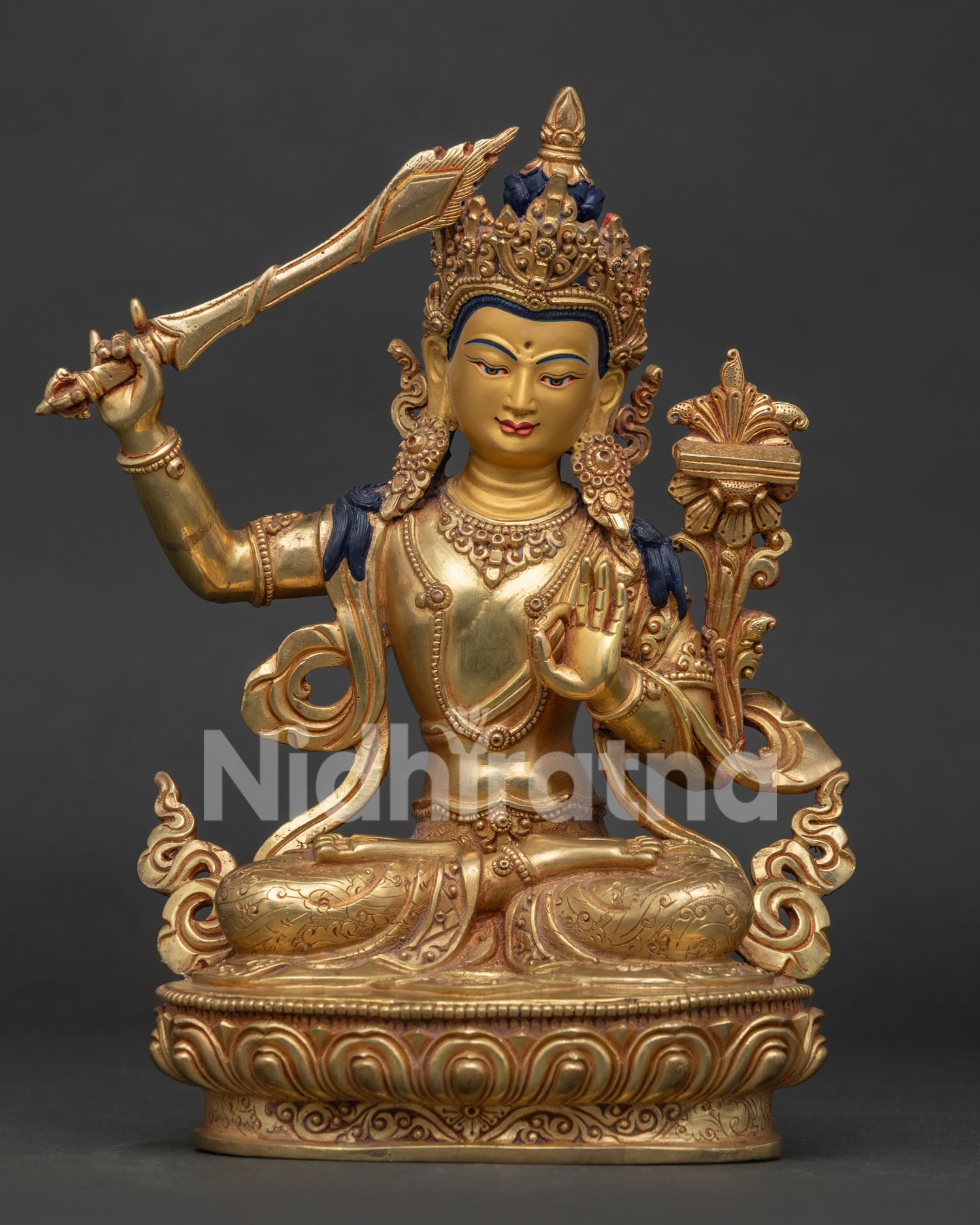 Manjushri Bodhisattva statue from Nepal in 24k gold gilded copper front view.