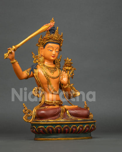 Manjushri Buddhist Statue right side view with gold gilded copper and Prajnaparamita scripture