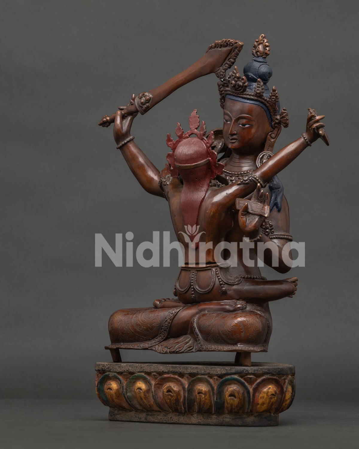 Manjushri consort holding kartika knife and skull cup in sacred union.