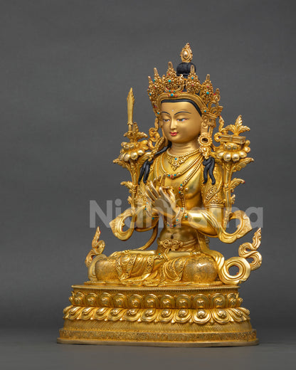Left side view of Manjushri statue showing Prajnaparamita Sutra and lotus pedestal