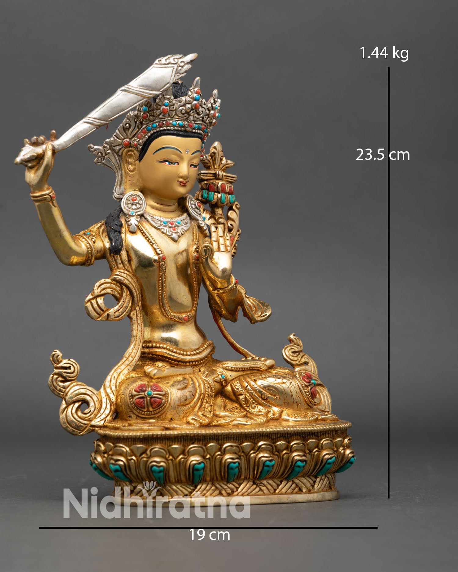 manjushri right side view, nepalese buddhist statue with lotus pedestal and gilding