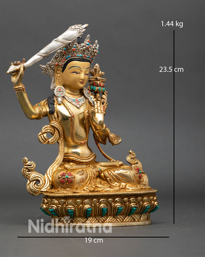 manjushri right side view, nepalese buddhist statue with lotus pedestal and gilding
