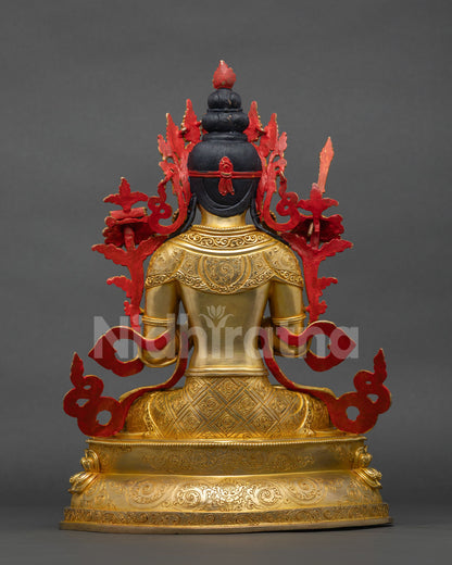 Back view of Manjushri statue showing flowing hair and gold-gilded robe detail