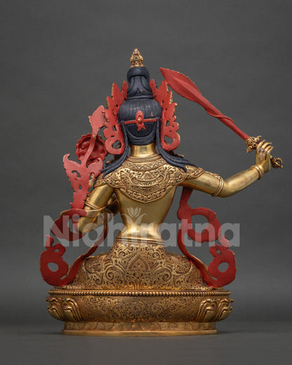 Manjushri Statue back view, gold-gilded crown and flowing scarves detail, Nepal handmade