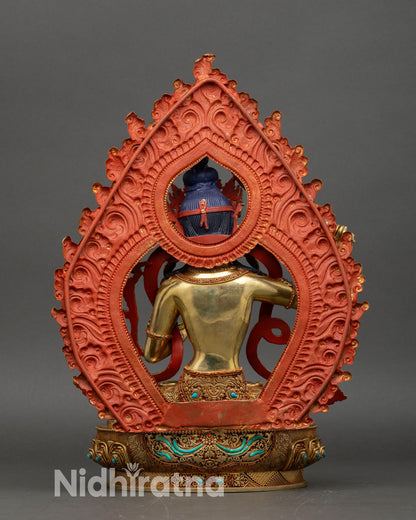 manjushri statue back view, ornate torana lotus base nepalese art