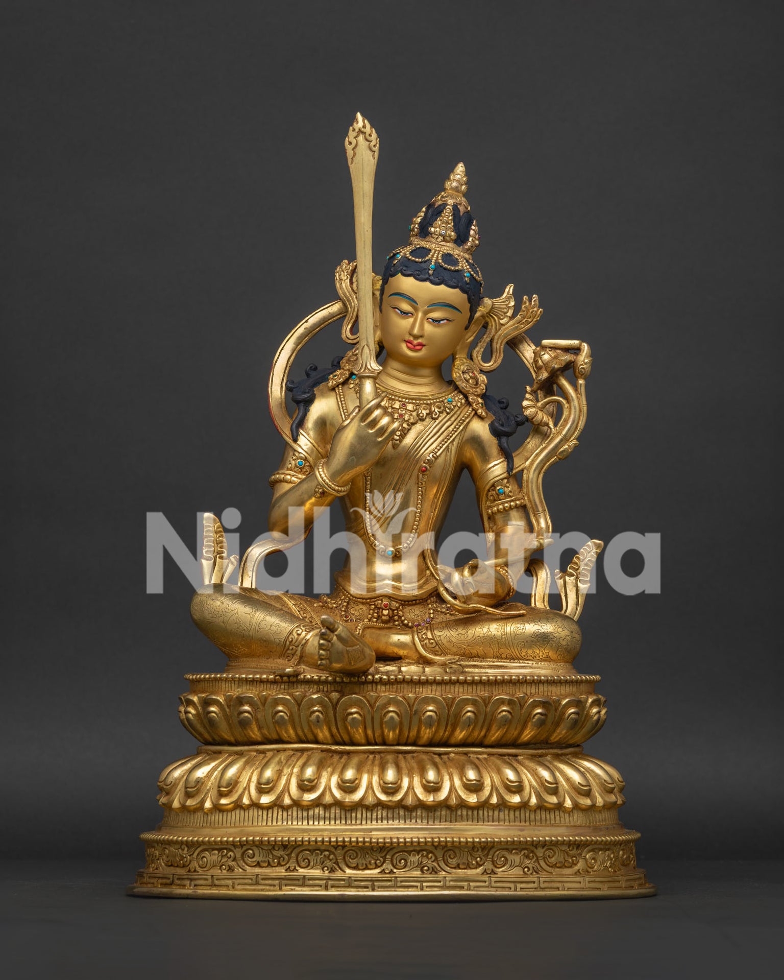 Manjushri Statue for Meditation in gold-gilded copper with turquoise and coral front view