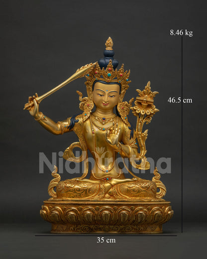 Manjushri Statue front view, gold-gilded Bodhisattva of Wisdom with flaming sword