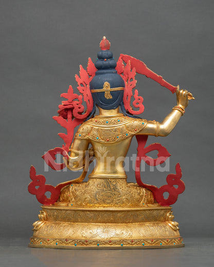 Manjushri Statue hand carved floral garment lotus pedestal.