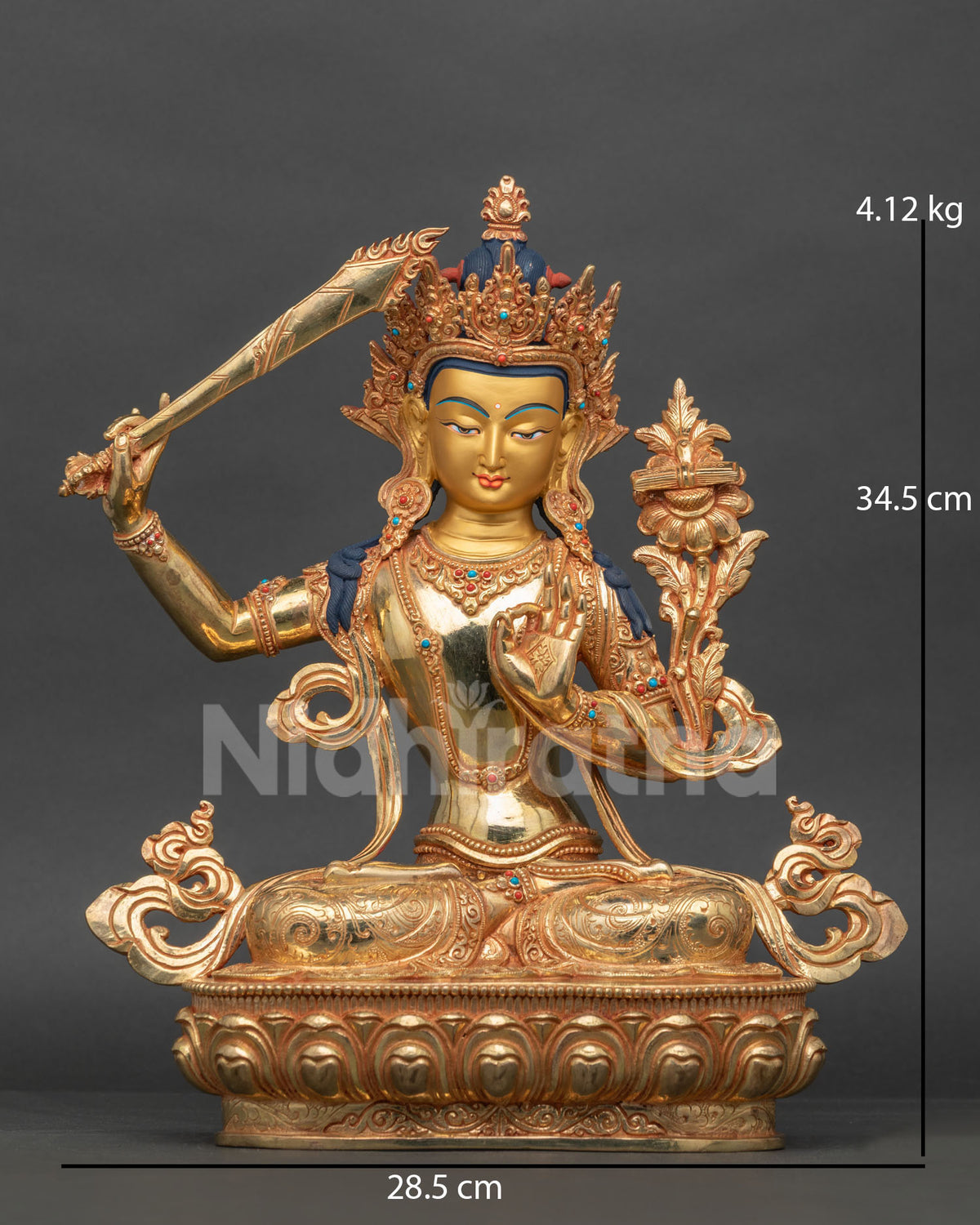 Manjushri statue handcrafted by newari artisans from patan nepal with gold fire gilded copper.
