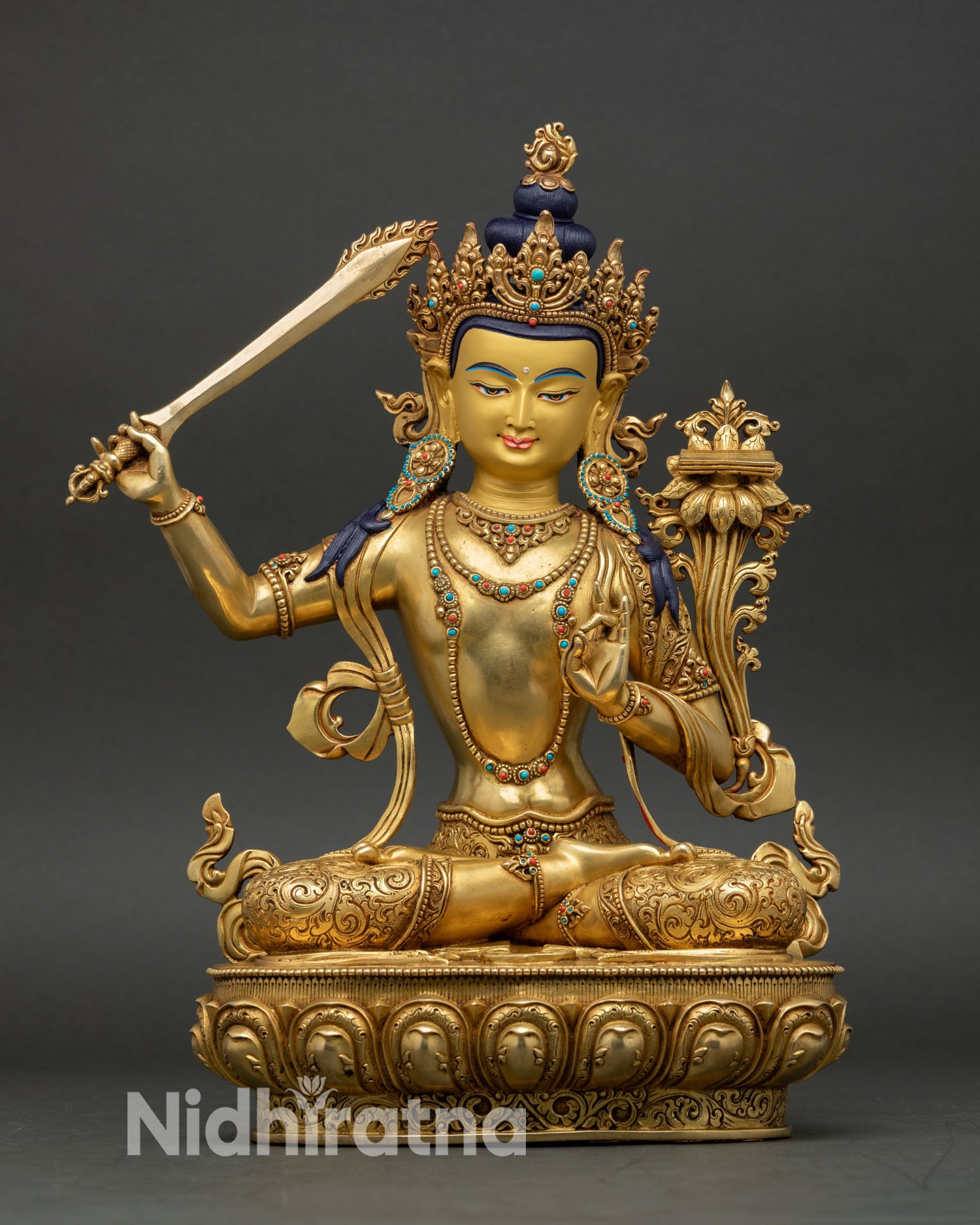 Manjushri statue handcrafted in Nepal, copper with gold fire gilding 