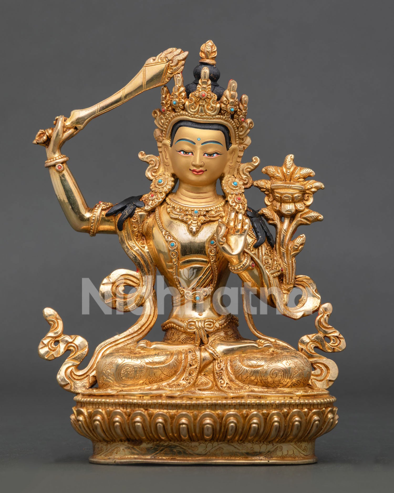 Manjushri Statue handcrafted in Nepal with gold-gilded copper body and turquoise coral stone adornments.