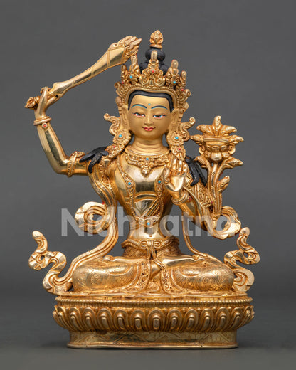 Manjushri Statue handcrafted in Nepal with gold-gilded copper body and turquoise coral stone adornments.