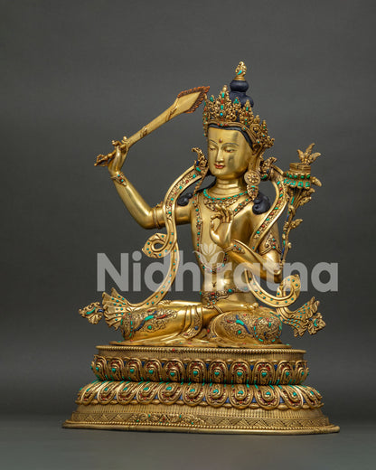 Manjushri statue left side view, utpala lotus and Prajnaparamita Sutra, gold gilded Nepal sculpture