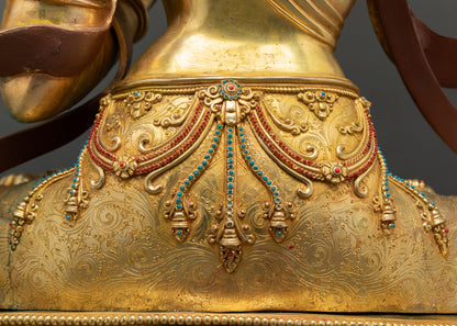 Manjushri statue lotus pedestal, jeweled beadwork garment detail