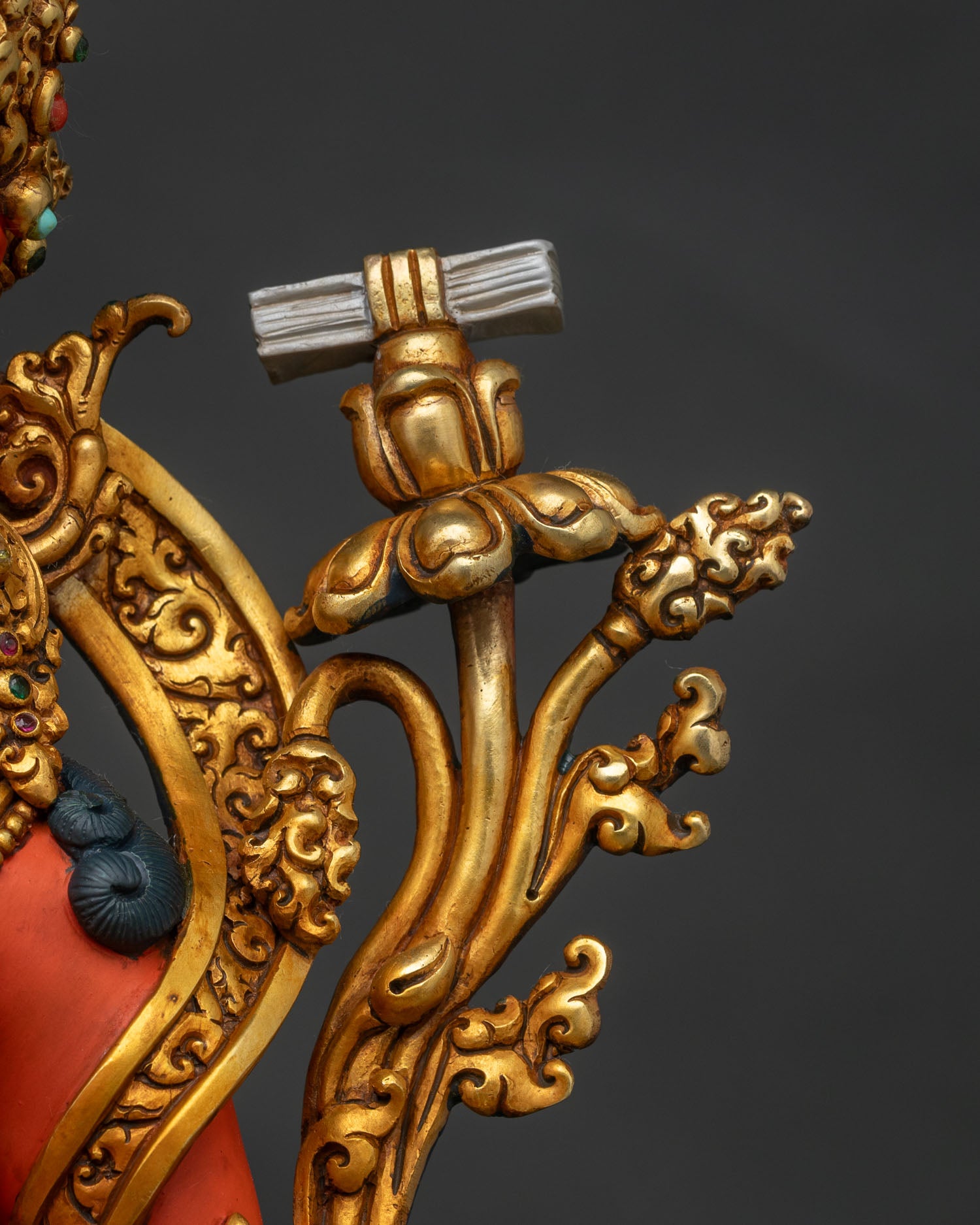 Manjushri statue prajnaparamita sutra book detail on gold lotus stem