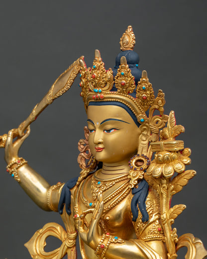Manjushri Statue side face close up Newari metalwork Patan Nepal.