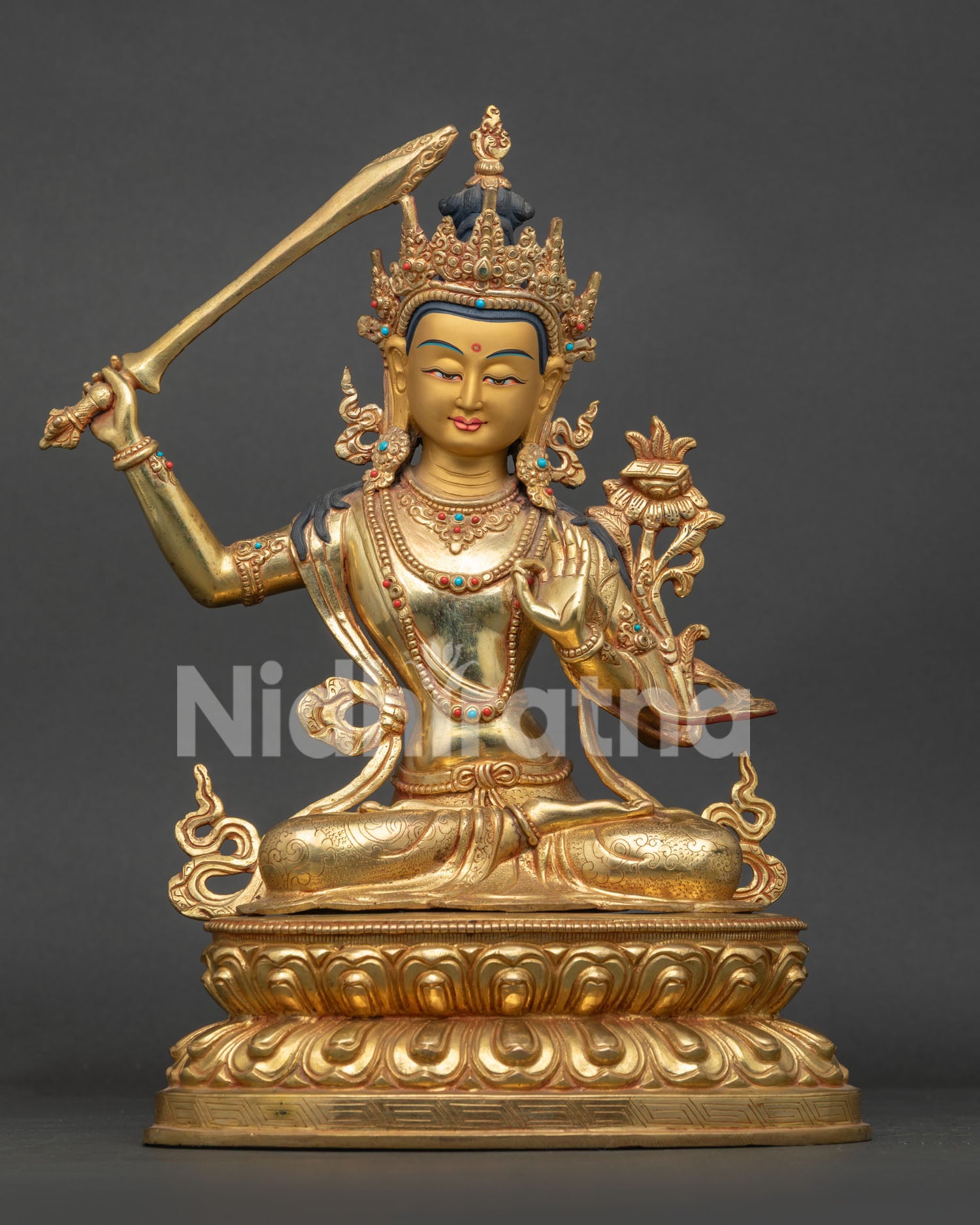 Manjushri Statue with gold fire gilding and double lotus pedestal.