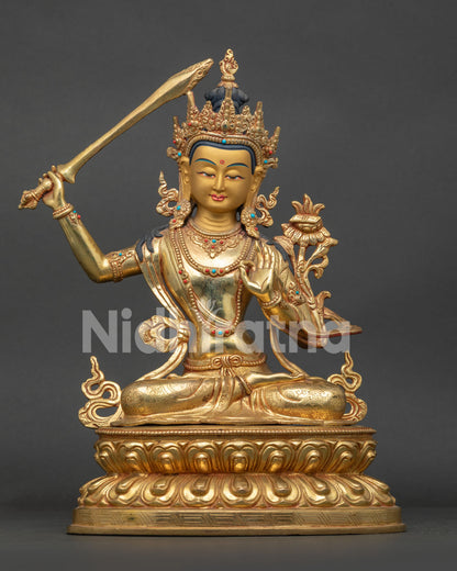 Manjushri Statue with gold fire gilding and double lotus pedestal.